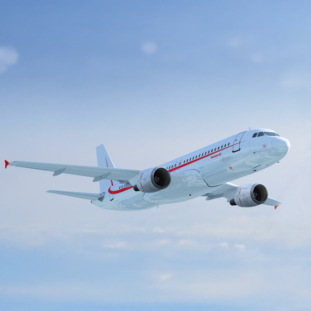 White Honeywell aeroplane with red detail shown in sky